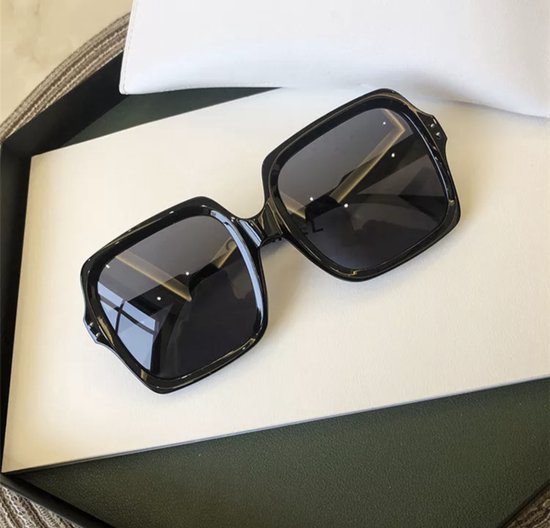 Julie Zonnebril | Black van Ace & Tate