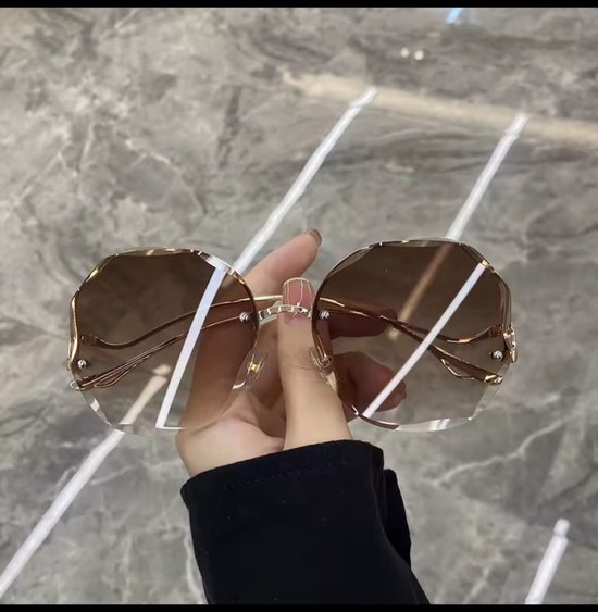 Mode randloze zonnebril voor dames veelhoekig frame bruin van Merkloos