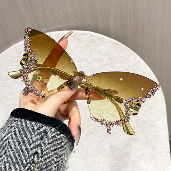 Retro klassieke dameszonnebril zonder frame met vlinder- of diamantvormig design en UV-bescherming (gouden glazen)